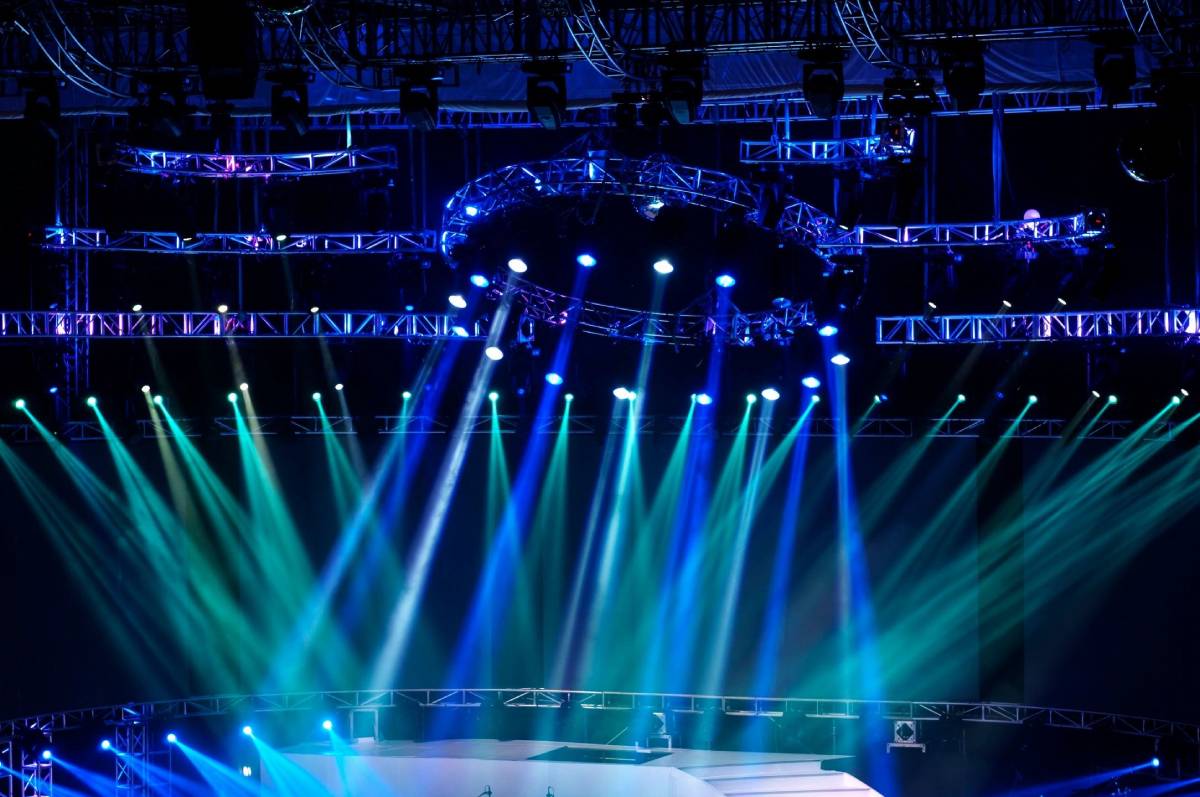 A stage with lights and blue lighting.